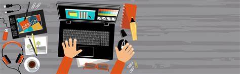 Design workspace with laptop and tools